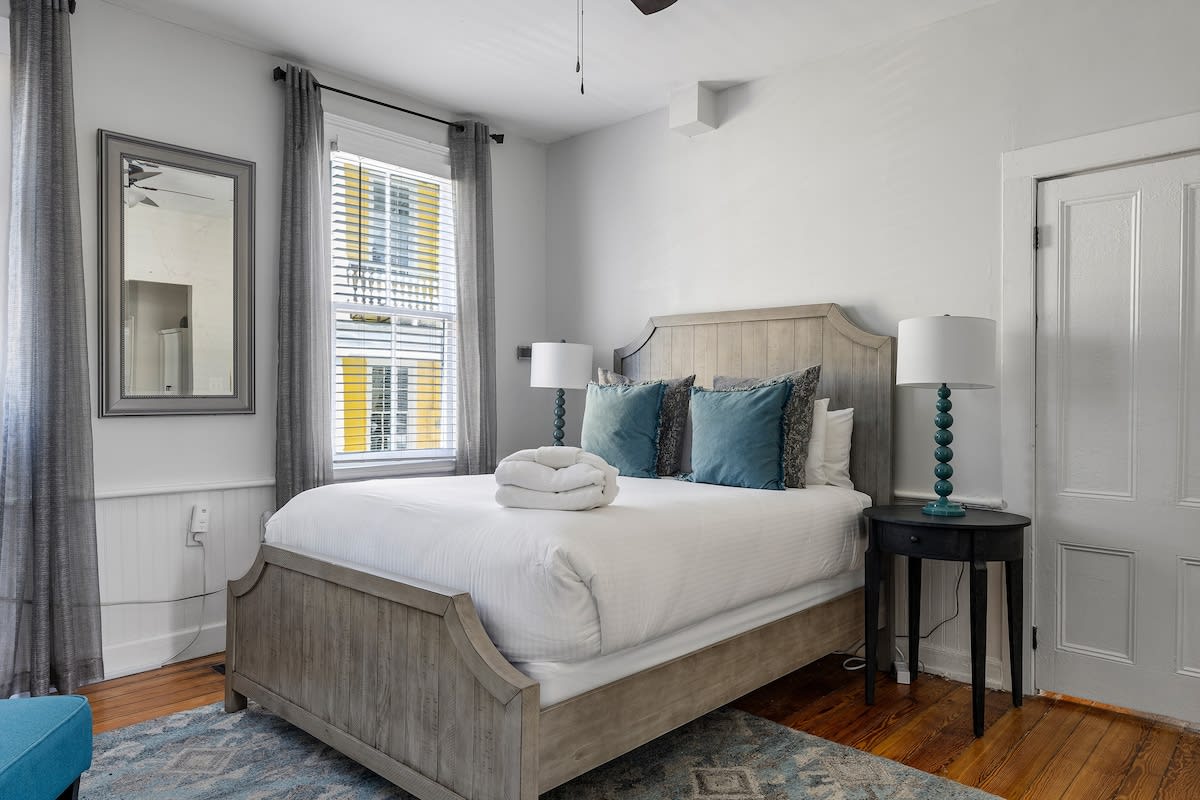 Bedroom #1: Queen Bed + Ceiling Fan + TV + Kitchenette  