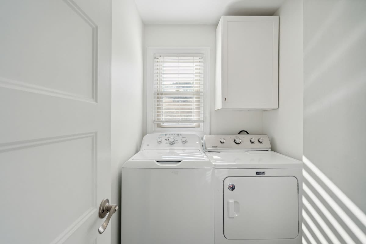Laundry room with Washer + Dryer for your convenience