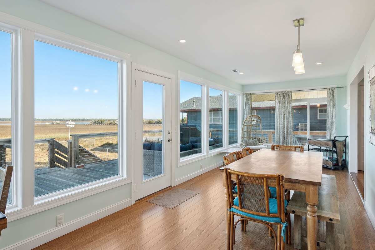 Dining area to enjoy a meal with family and friends while overlooking the marsh