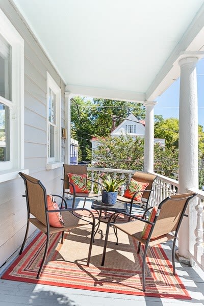 Outdoor seating area on the second story balcony