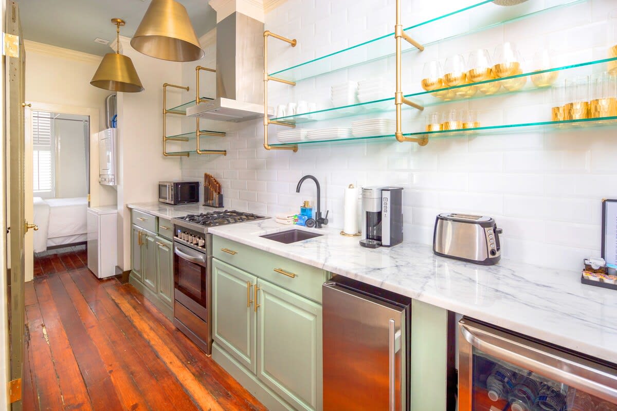 Second floor kitchen space! There are two full kitchens and three kitchenettes throughout the home!