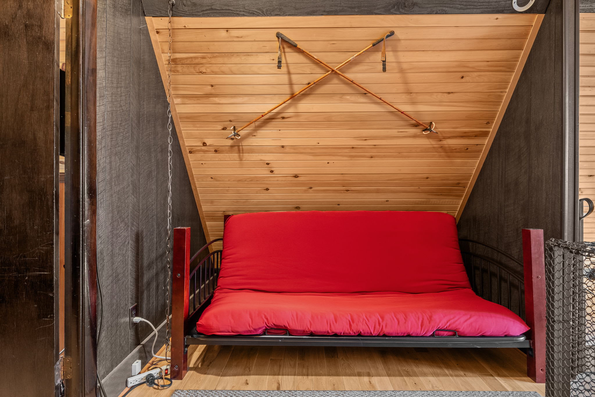 Relax in this stylish nook with vintage ski decor and a rustic cabin feel.