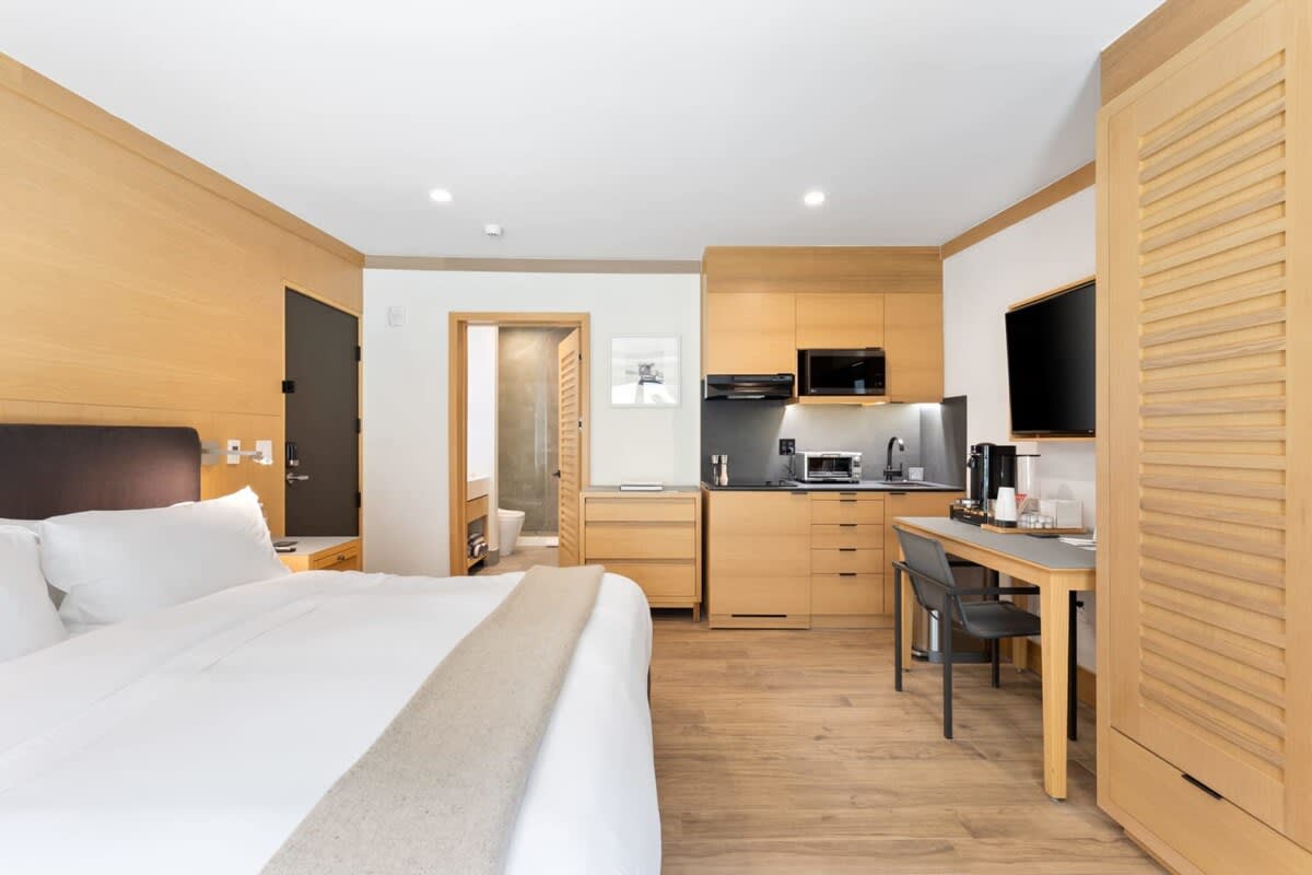Beds are fully outfitted in luxurious, hotel-grade linens.