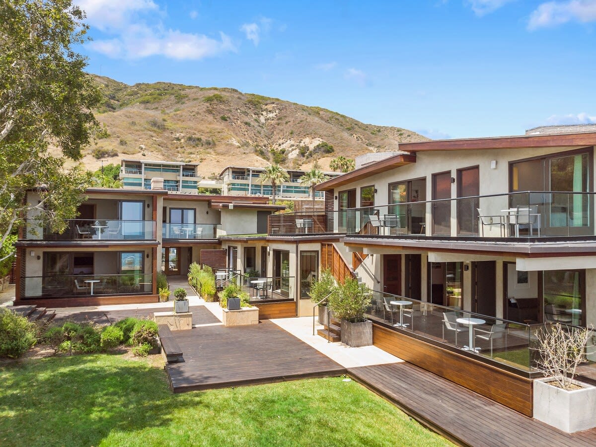 Expansive grassy area to stretch and reconnect as you feel the ocean breeze
