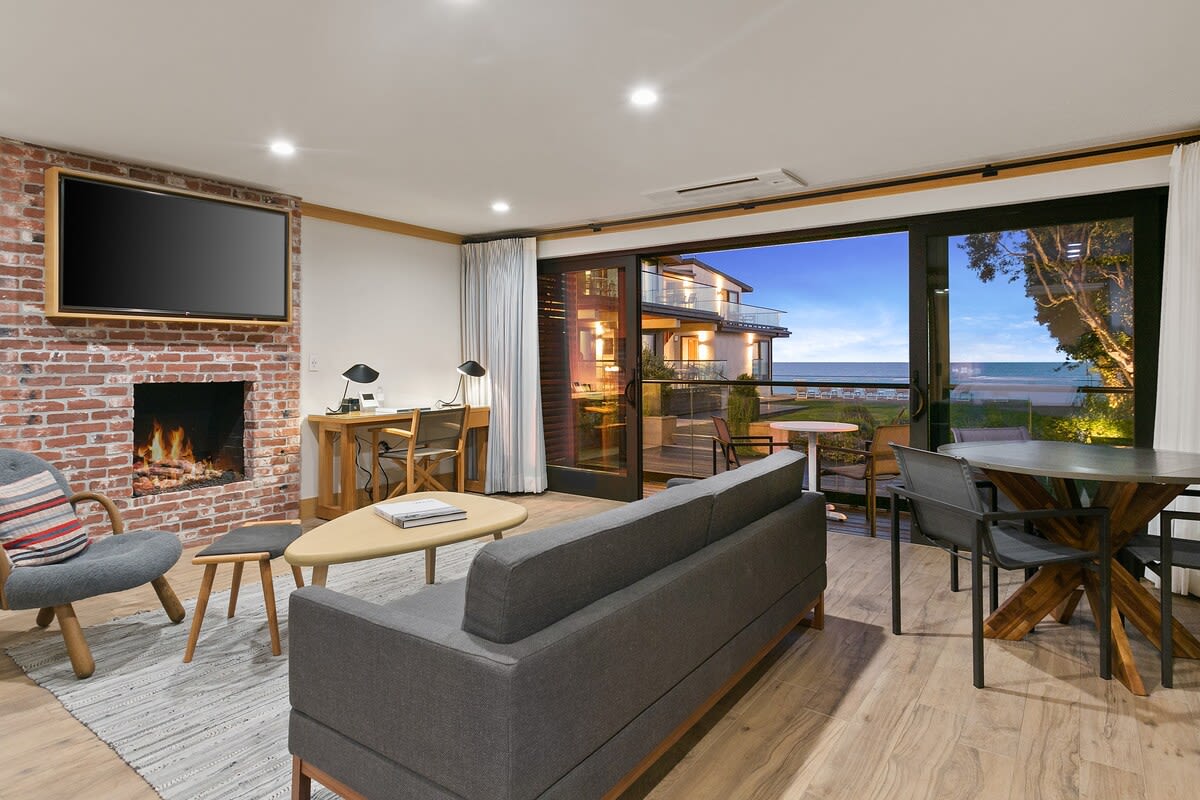 Watch the sunset from your suite with a shimmering glass of champagne