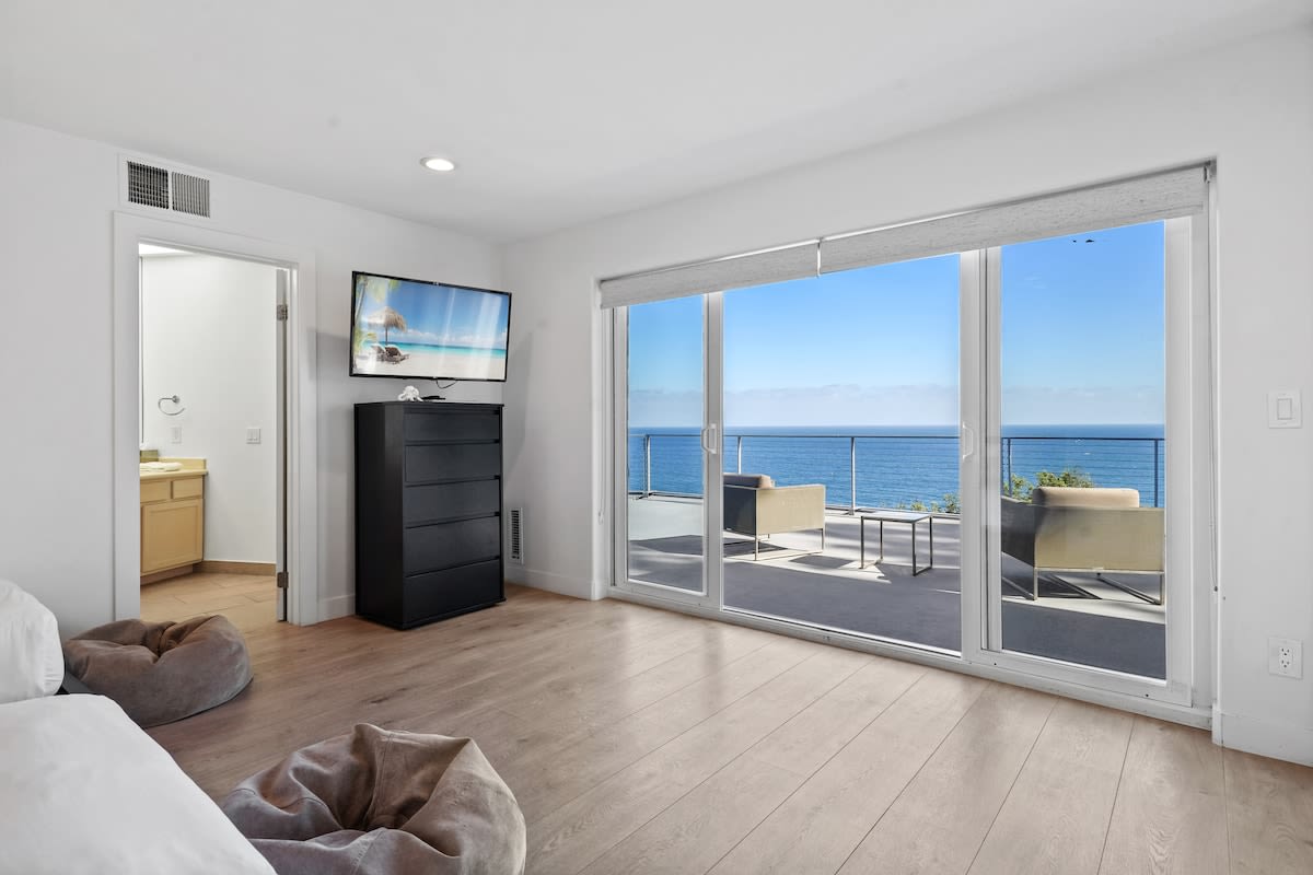 Enjoy your favorite shows on the smart TV in our second bedroom.