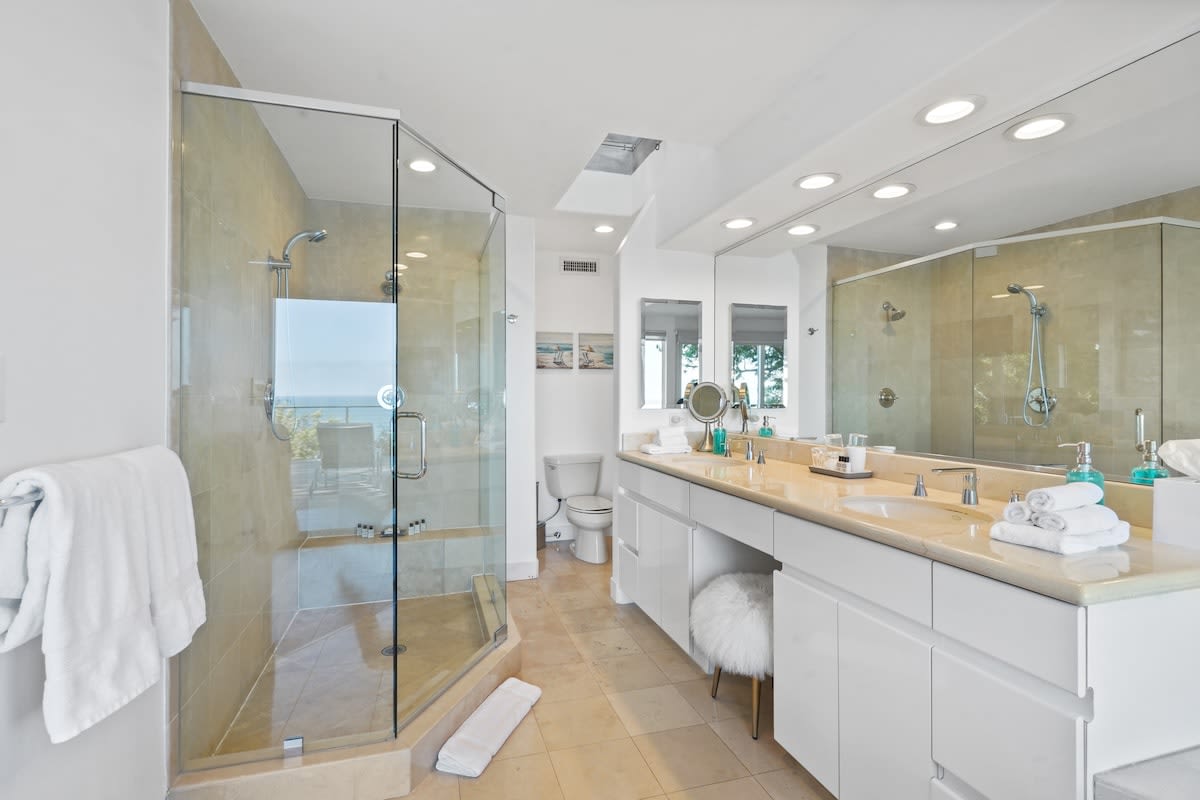 Experience ultimate luxury in our master ensuite, boasting his & hers sinks and a spacious shower.