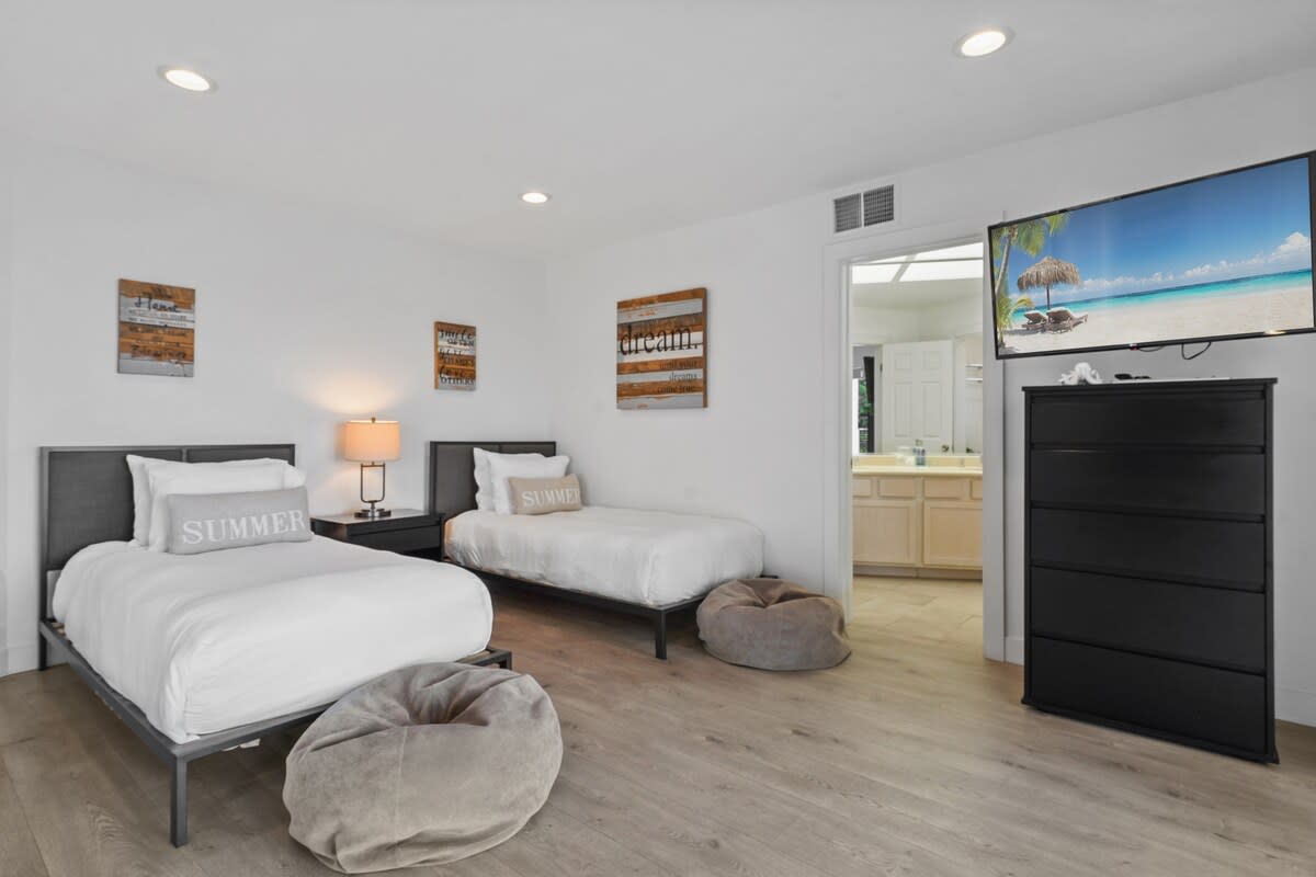 Rest and relax in the comfort of our second bedroom's twin beds.