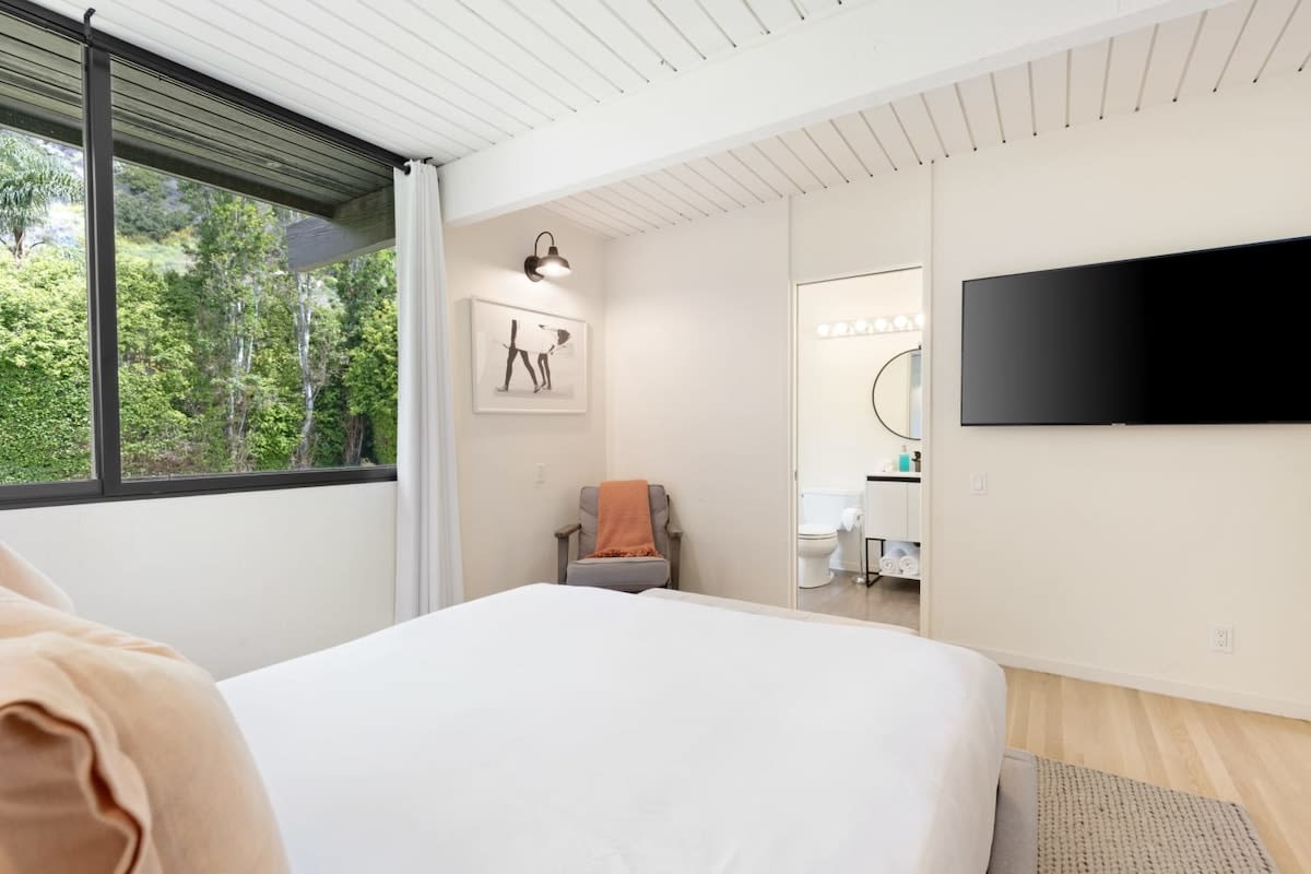 Lay down on the comfortable bed for a nap or switch on the flat-screen TV in the 2nd Guest Bedroom