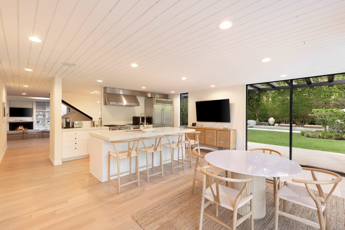 Kitchenette with seating and counter stools
