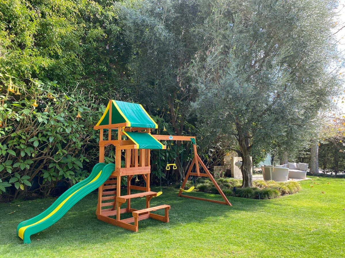Slide, swings and fort.