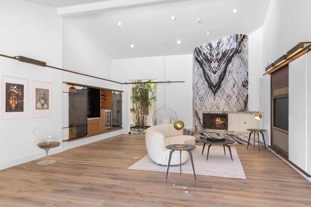 The back wall has a bar area perfect for entertaining