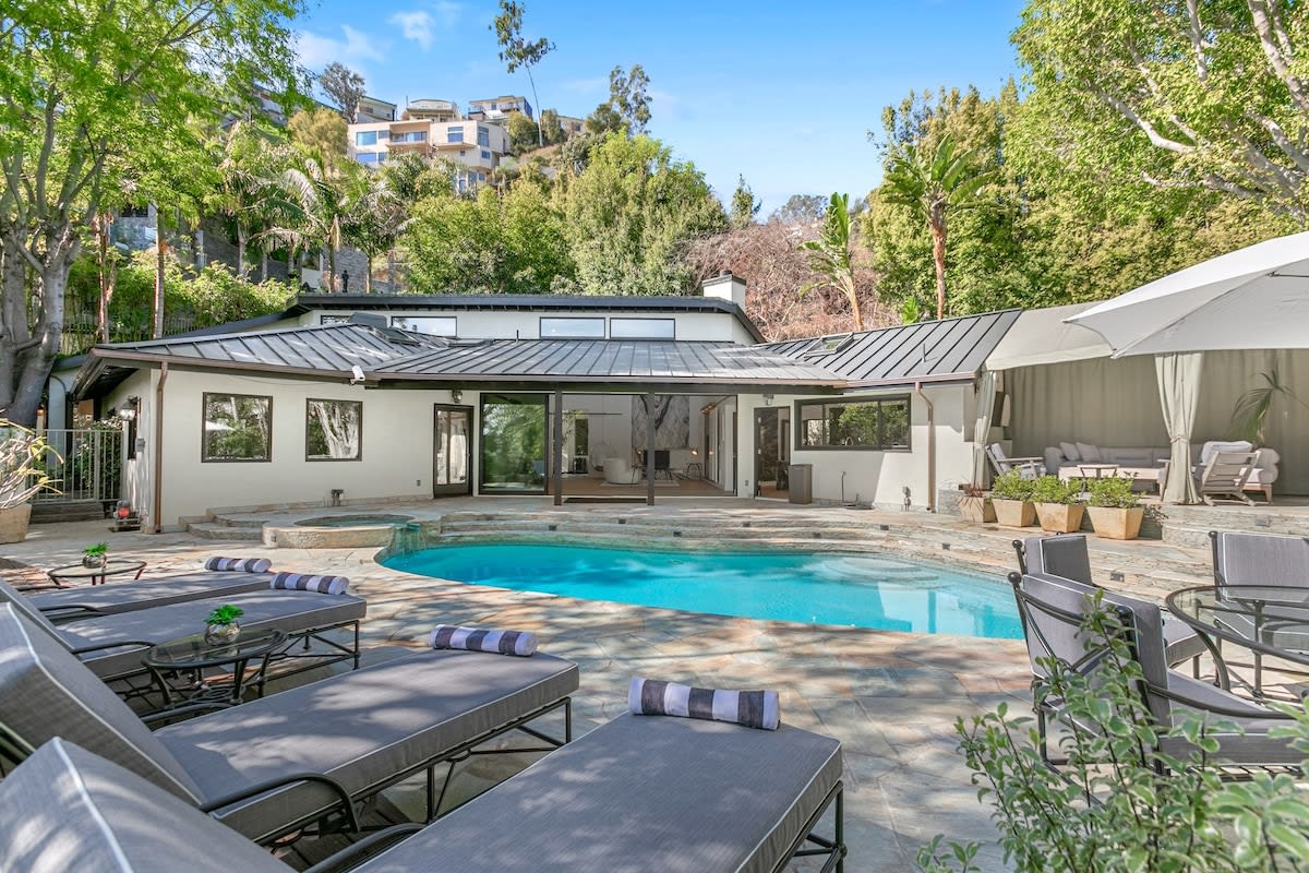 Outdoor lounging area by the pool, beautiful California weather