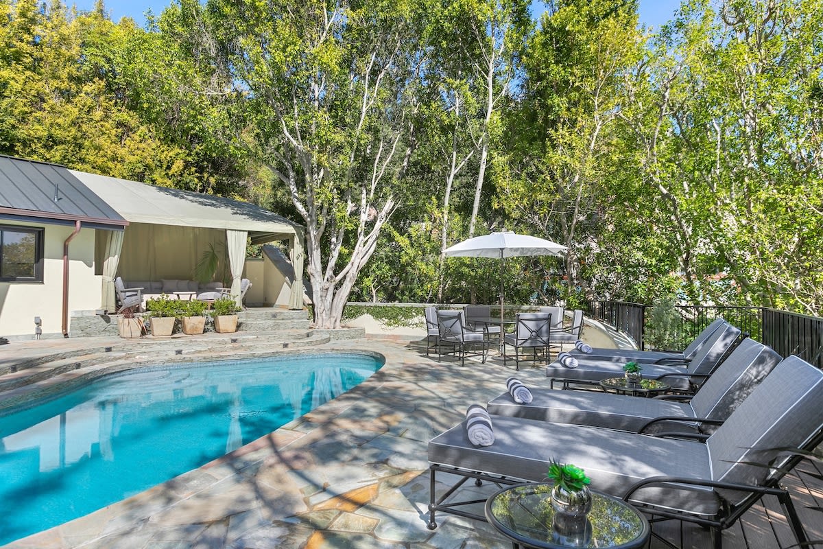 Bask in the sun by the pool in the Hollywood Hills