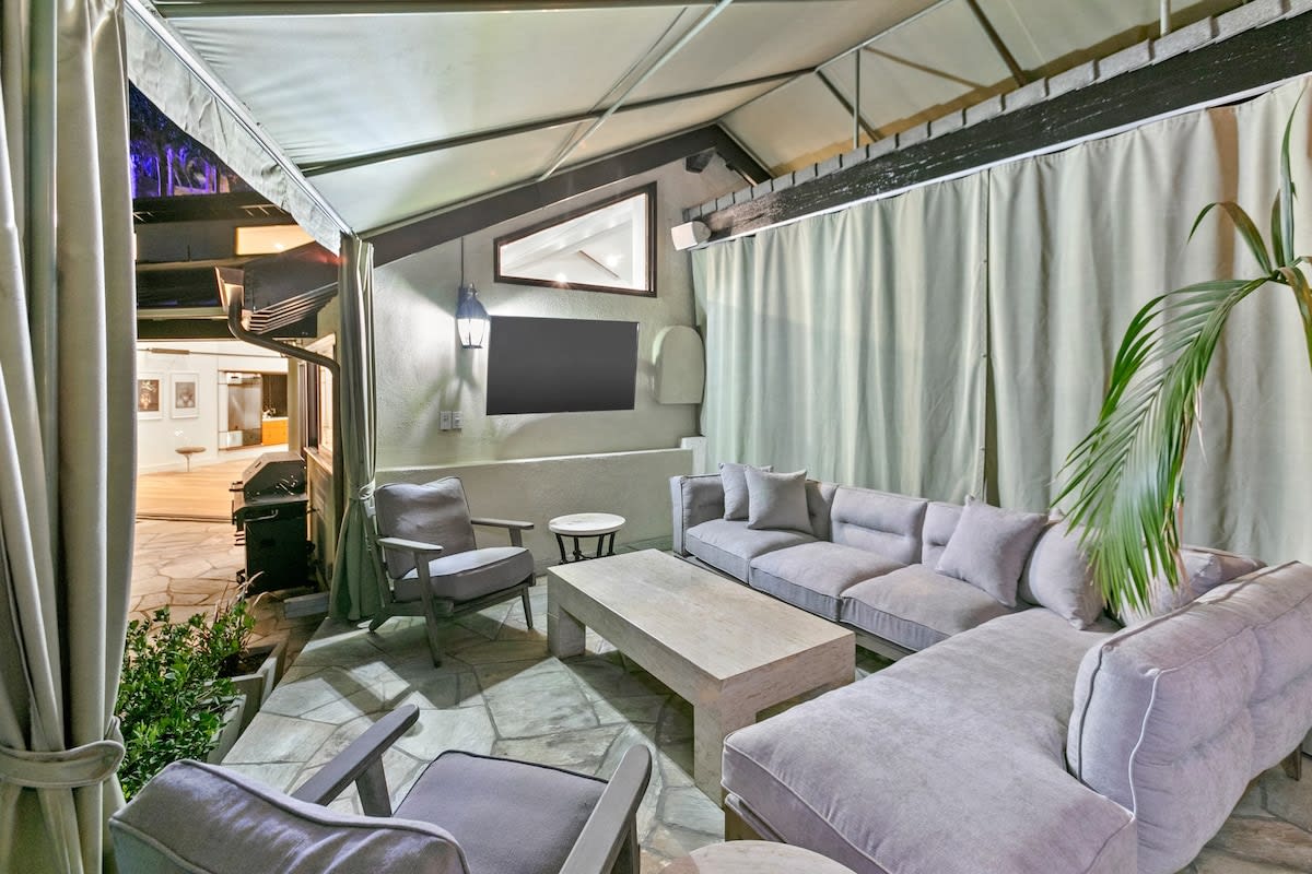 Outdoor cabana with large seating area