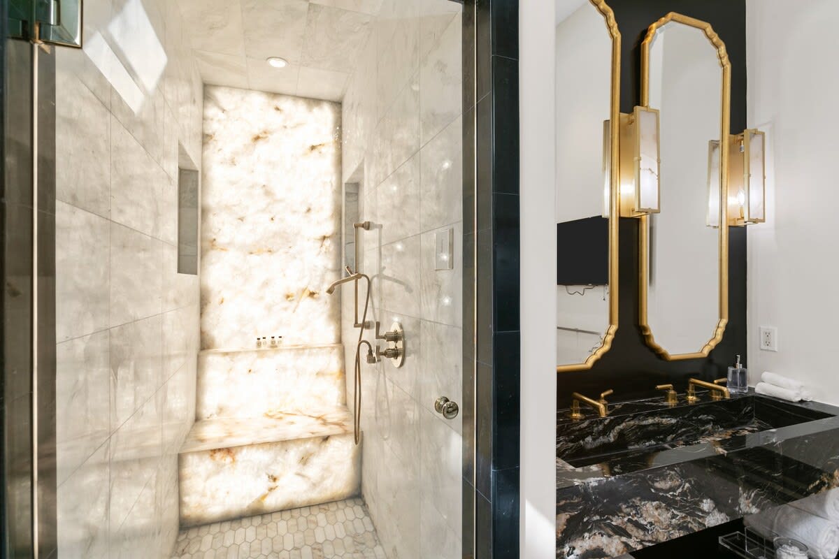 Steam shower with back lit onxy tiles