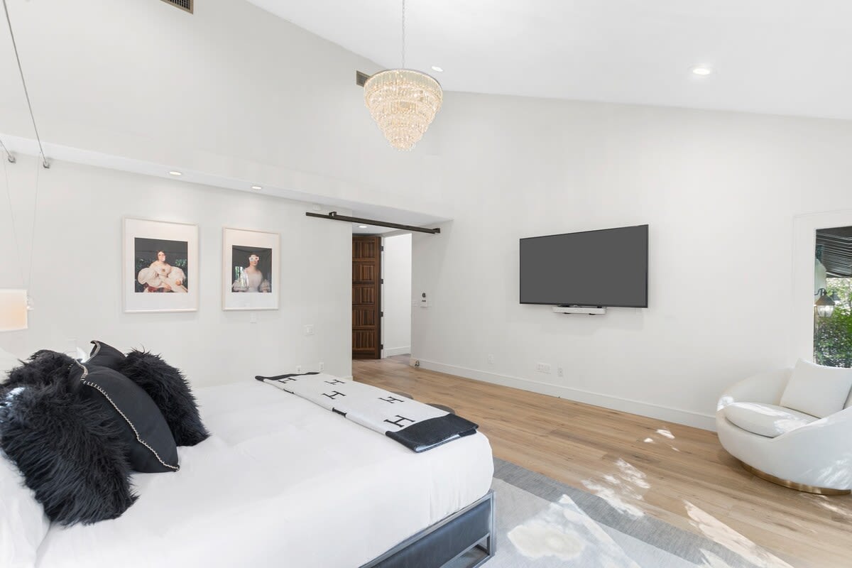 70 inch television in the master bedroom