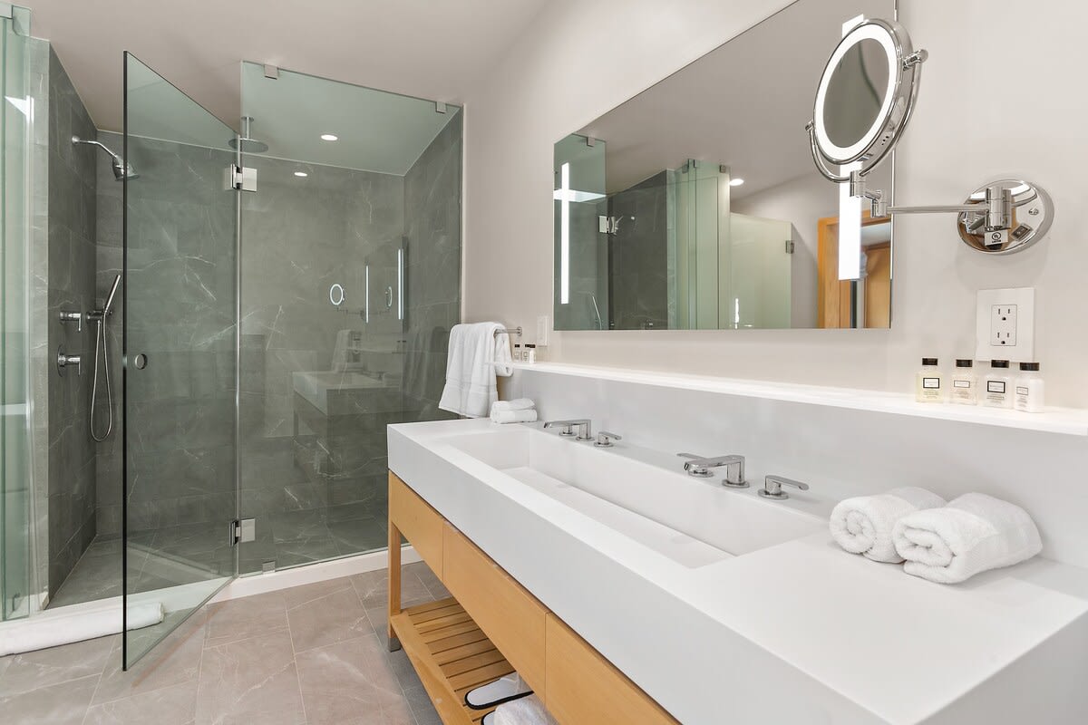 High quality finishes include include Toto Neorest 700 Dual Flush Bidet and a glass framed rain shower.