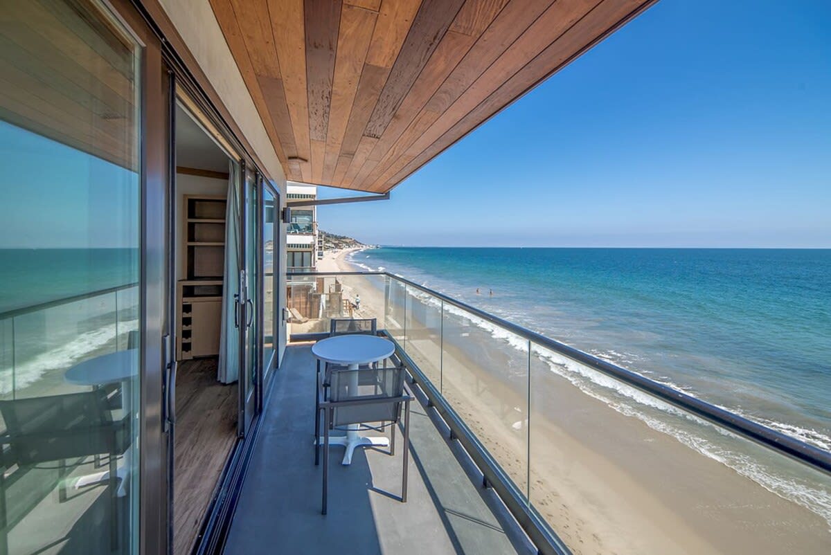 Enjoy your morning coffee with sunlight and fresh ocean air.