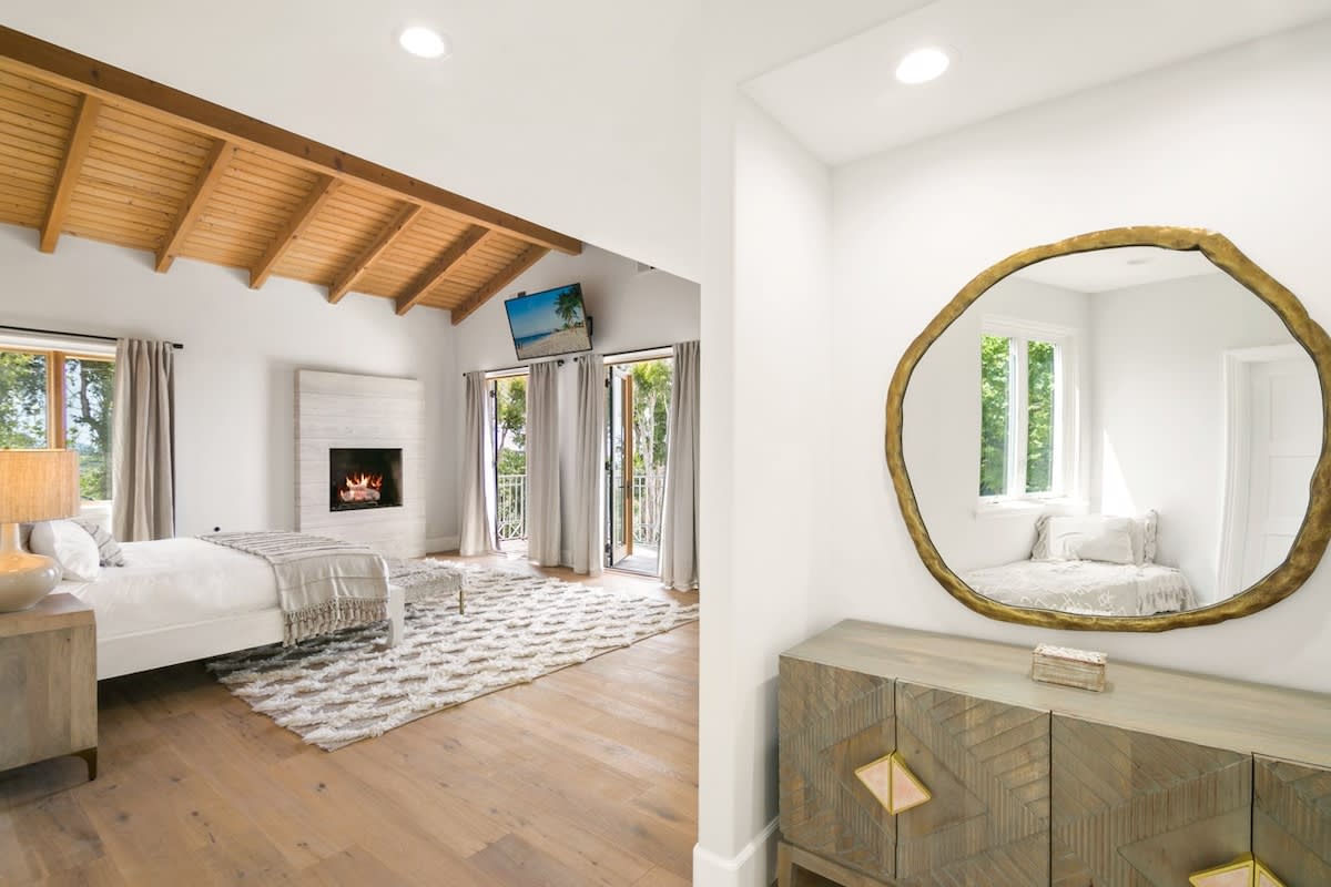 Open master bedroom with a large patio to step onto and admire the ocean views.
