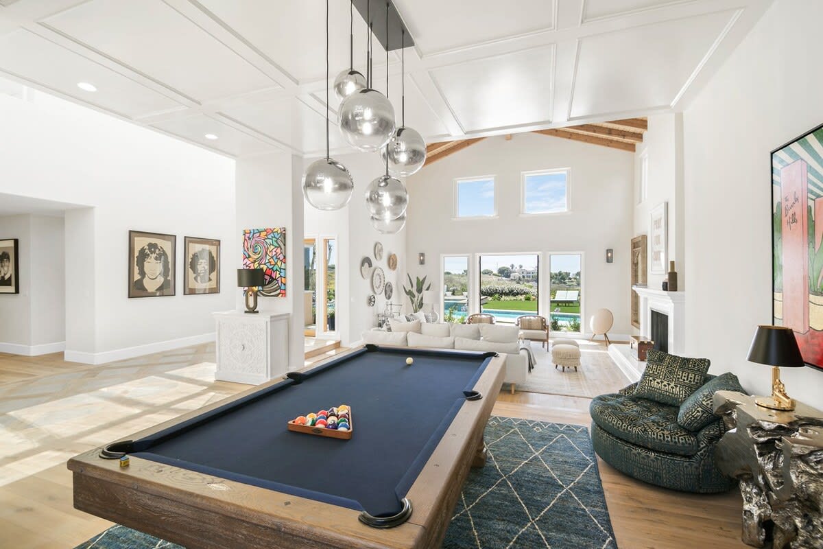 Pool table in the living space making it the ultimate fun getaway for all.