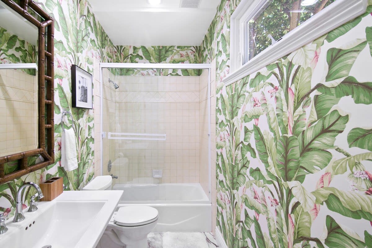 Floral feels in this guest bathroom.