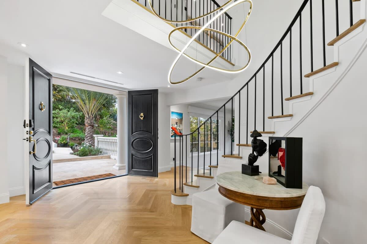 This property is uniquely outfitted with high end Art work, state of the art technology in the beauty of a grand French Chateau.