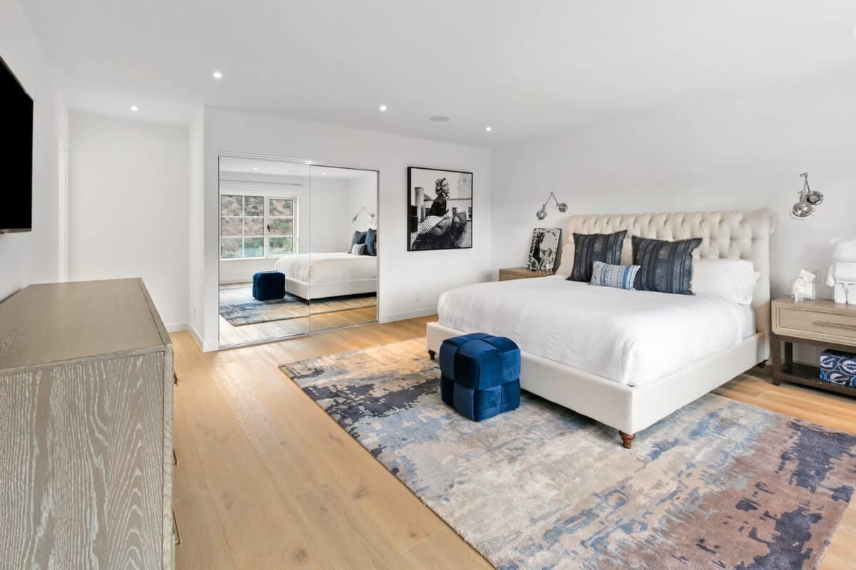 Guest bedroom with Modern accents and Luxurious King size bed.