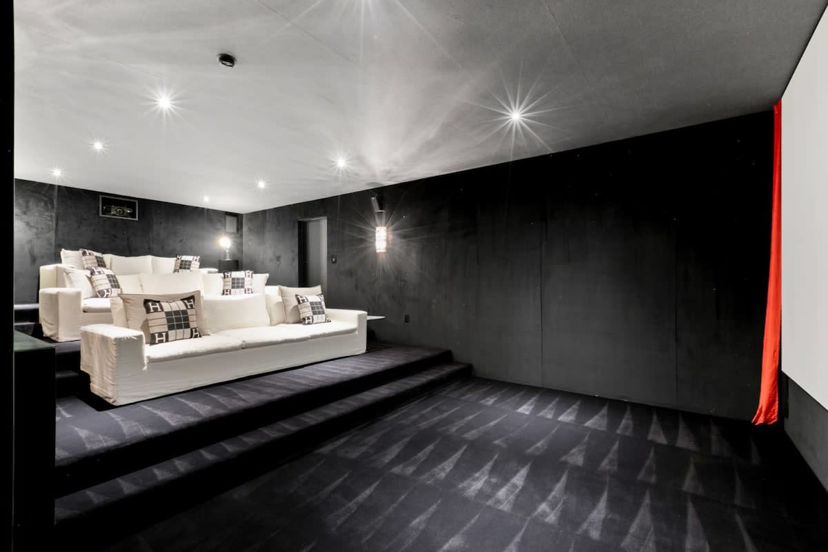 Get comfortable in the Theater room’s cosy space, for the perfect movie night.