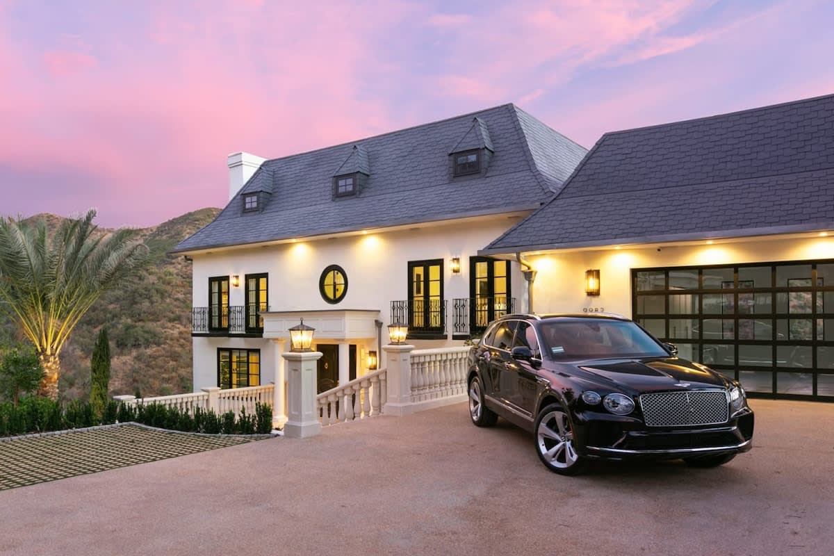 Expansive driveway leading up to this picturesque French style Chateau in Beverly Hills, California