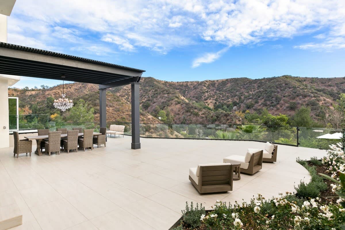 Outdoor dining area with spacious patio and backdrop of the finest scenery California has to offer.