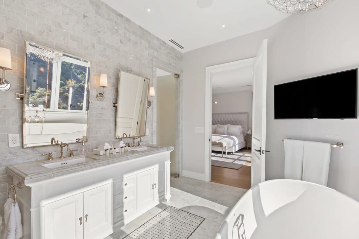 Master bathroom with stand alone soaking tub and his and hers sinks