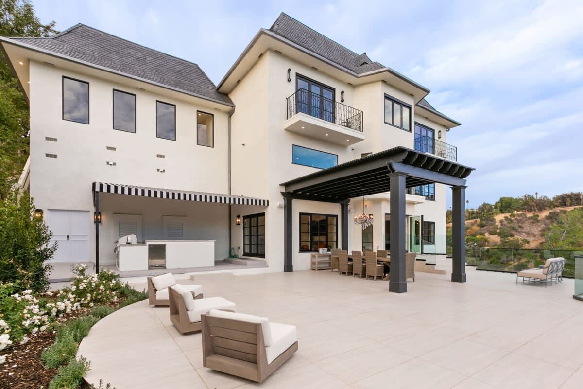 Gorgeous French Chateau accents for this unique home in set the hillside of Beverly Hills.