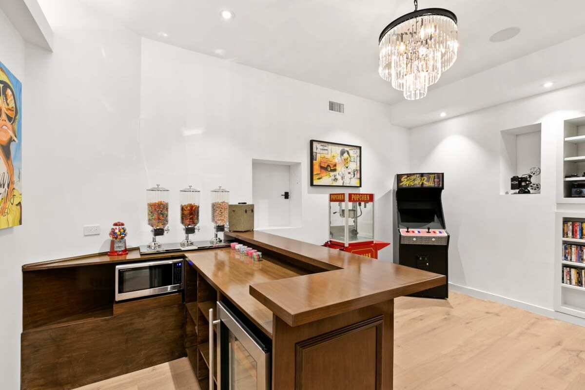 Mini bar with mini fridge, microwave and extra storage space for all of your fun time necessities