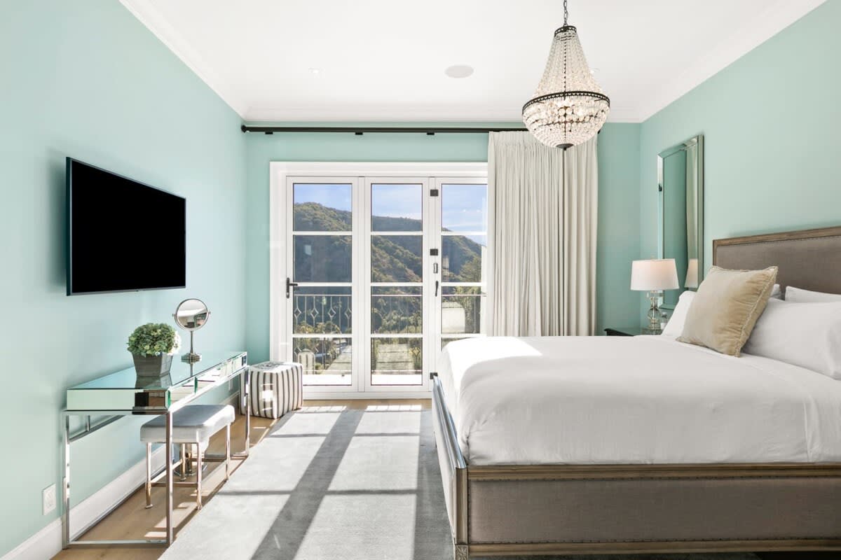 Enjoy this stunning bedroom and comfy King size bed while enjoying a movie or book.