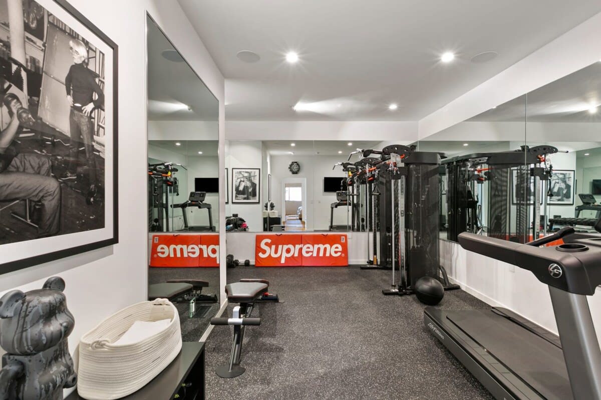 Fully equipped indoor gym for your fitness needs, including a treadmill, free weights up to 45 lbs, "Inspire" functional trainer machine,  and exercise ball.