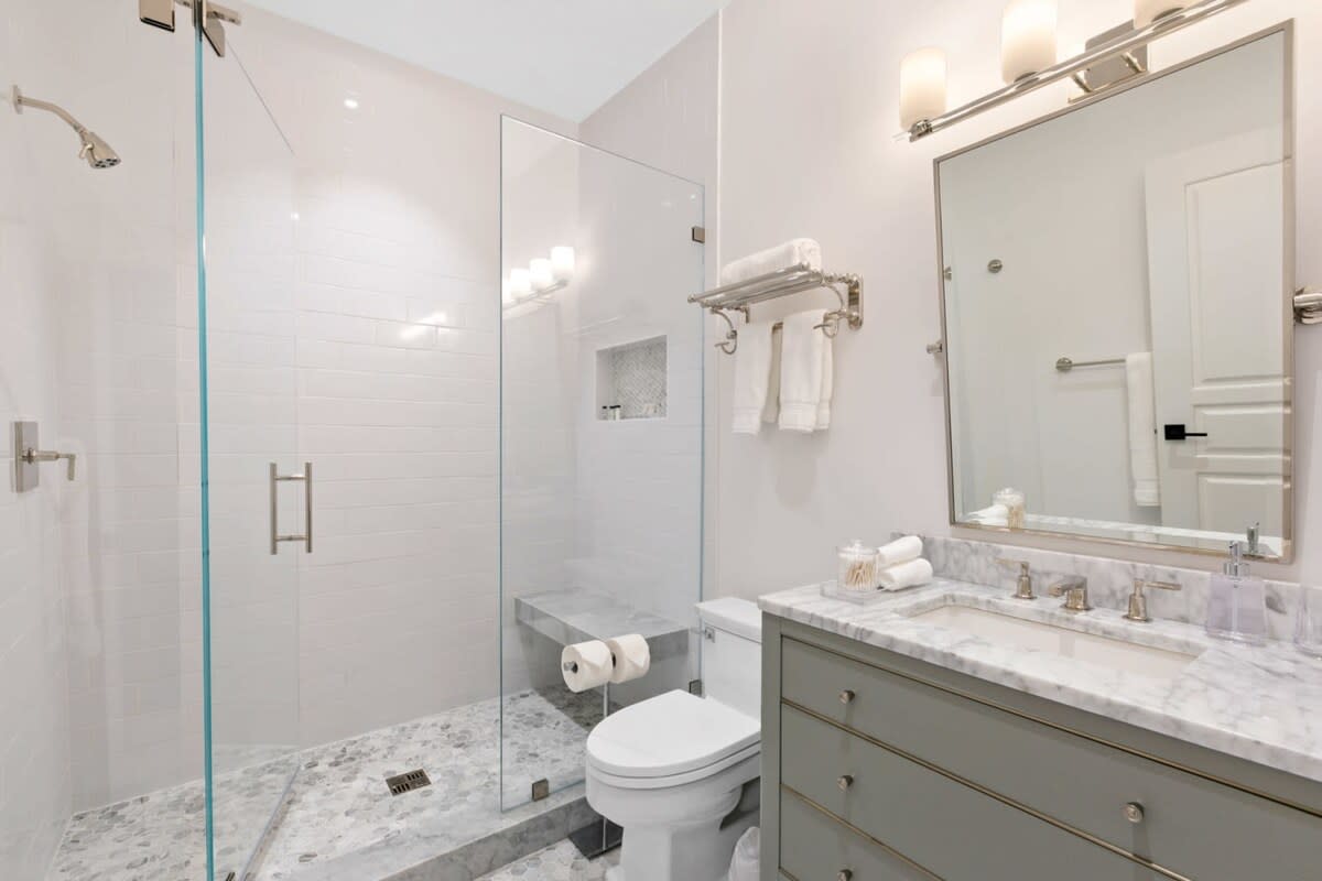 The rain shower is the perfect way to rejuvenate in this modern retreat.