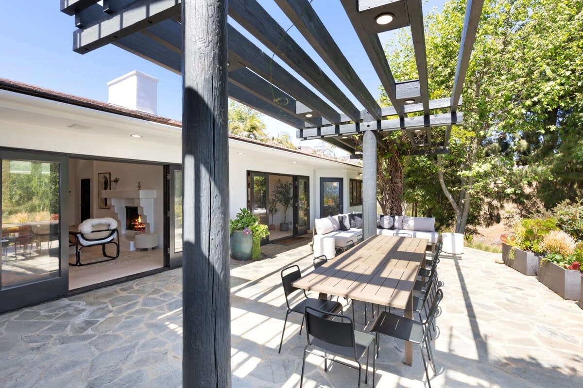Outdoor dining table seats 12.