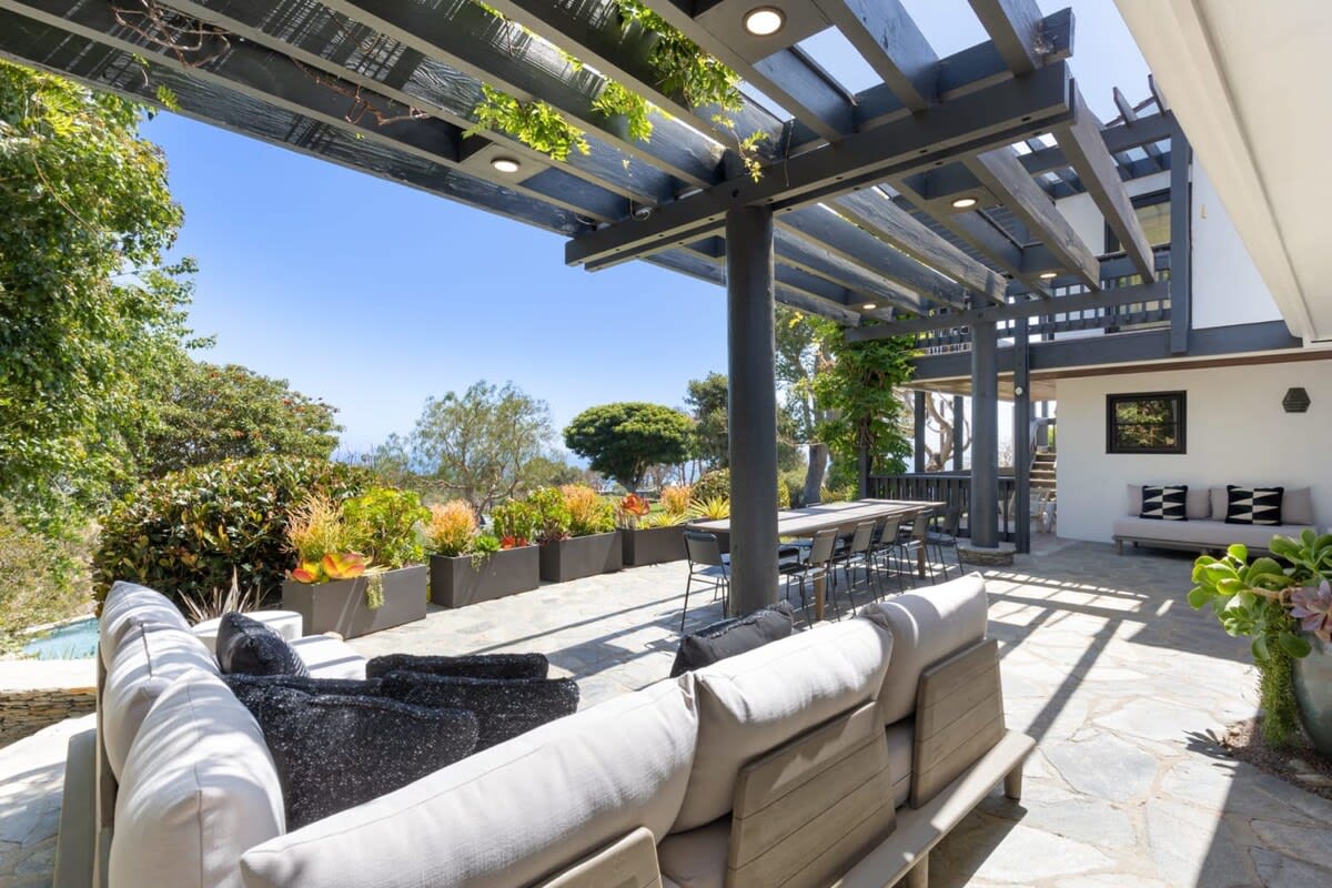 Luxurious outdoor seating overlooking the peaceful serenity.
