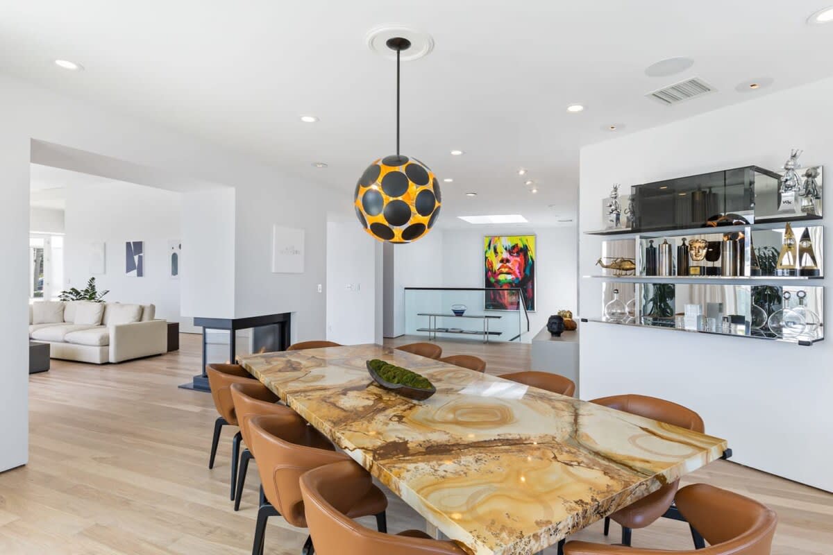 Dining area with uniquely special art and designs aligning the walls