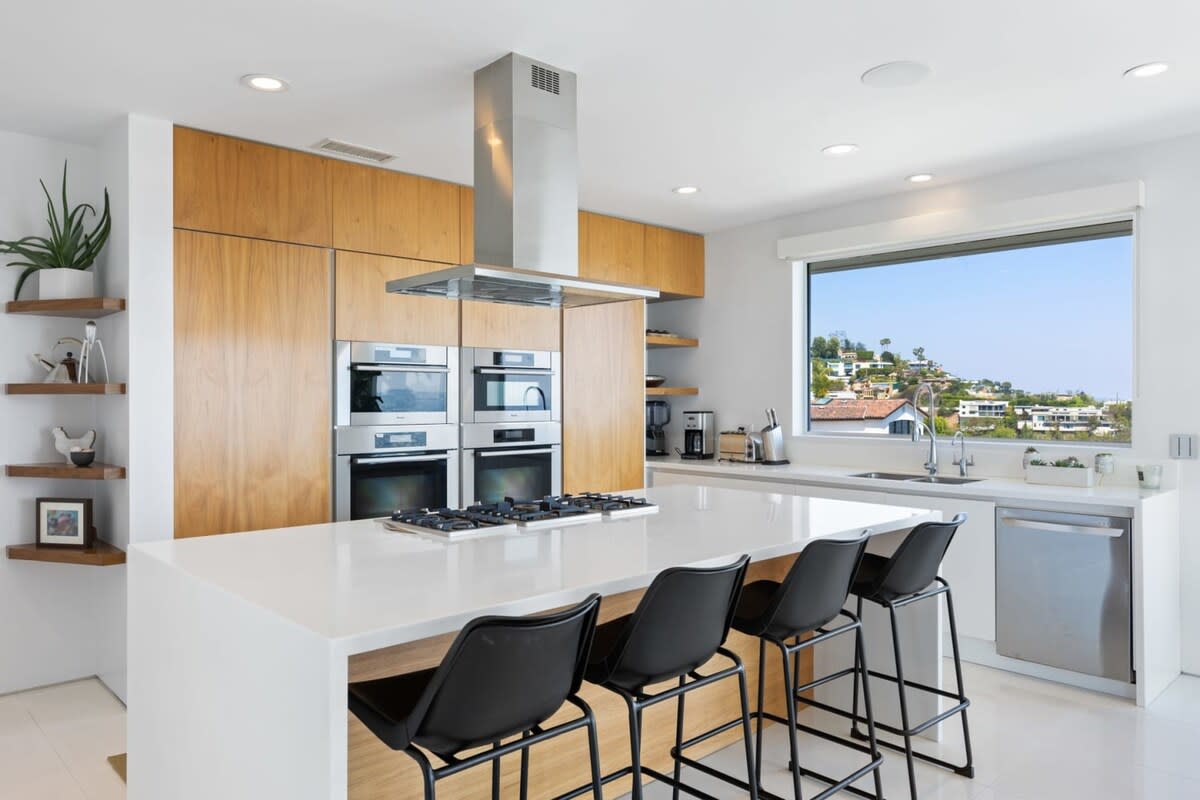 Designer Kitchen with High End Appliances and Furniture.
