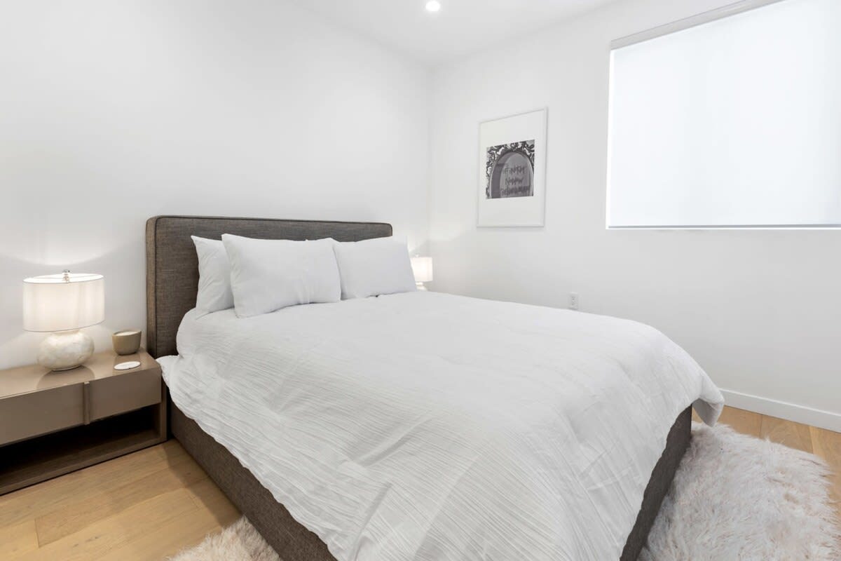Upstairs guest bedroom with a comfy bed and fresh sheets