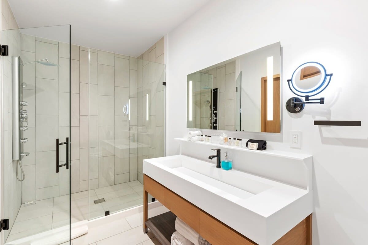 Let the spacious rain shower leave you feeling refreshed