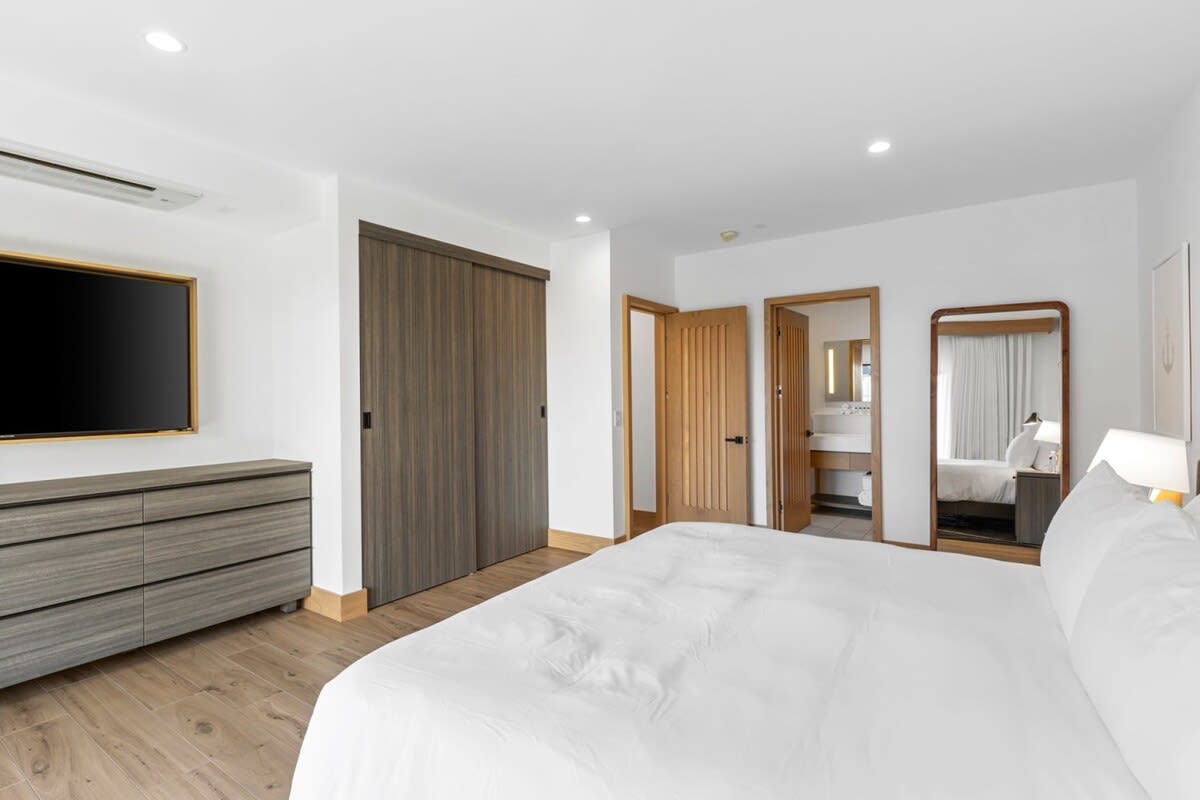 Beds are fully outfitted in luxurious, hotel-grade linens.