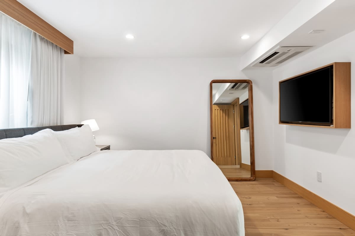 Beds are fully outfitted in luxurious, hotel-grade linens.