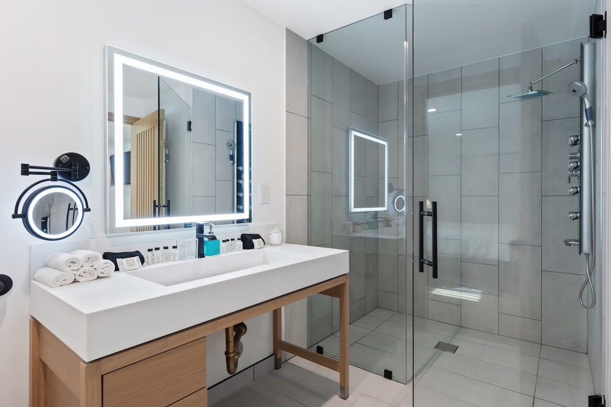 LED lit vanity mirrors and spacious rain shower to leave you feeling refreshed