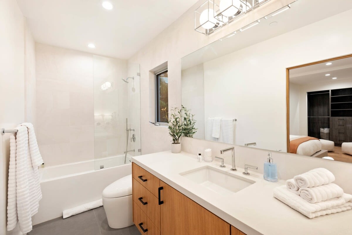 Let the spacious guest bathroom leave you feeling clean and relaxed
