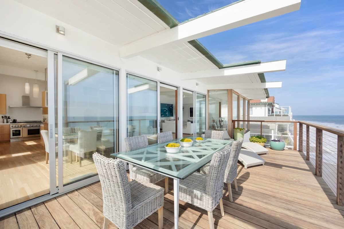 Dine al-fresco style at the 6-person outdoor dining table.