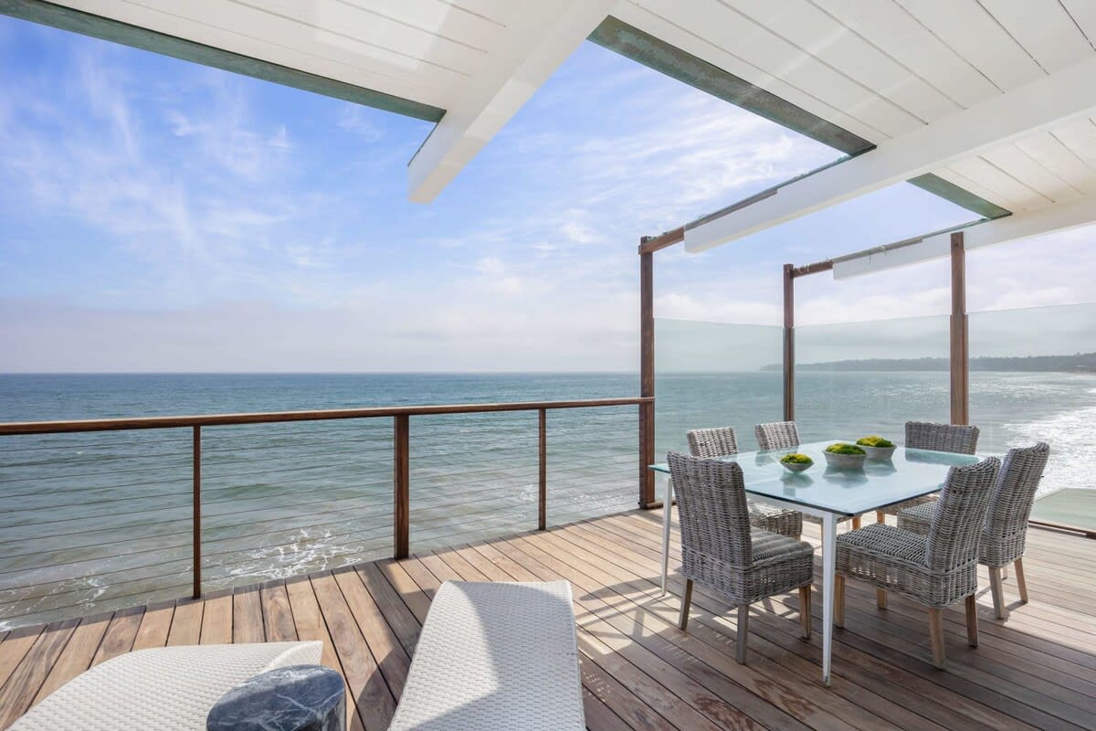 Sip on your morning brew on the deck with sunlight, fresh air and shade.