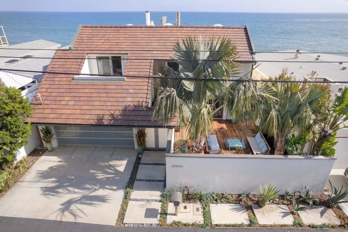 Surrounded by lush green natural features.